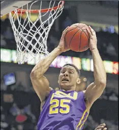  ?? JOHN BAZEMORE / AP ?? If college basketball was more like college baseball, players such as LSU’s Ben Simmons could choose to go pro right out of high school, or they would have to remain in college for three years or until they reach 21.