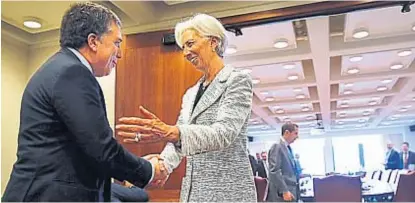  ?? (AP / ARCHIVO) ?? Washington. El ministro Dujovne, con la titular del FMI, Christine Lagarde, la semana pasada.