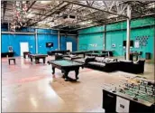  ?? DEPARTMENT OF HEALTH AND HUMAN SERVICES ?? Children can play pool and foosball in a rec room at Casa Padre, which can house nearly 1,500 immigrants.