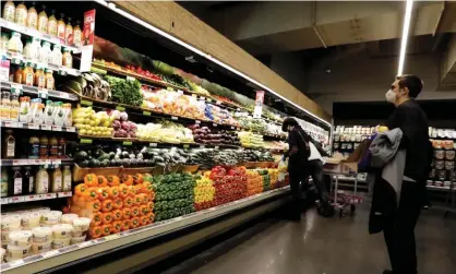  ?? Photograph: Peter Foley/EPA ?? Whole Foods Market at Columbus Circle, New York. ‘Now I roast mountains of vegetables. I do a lot with sardines. My children have grown tired of saying, ‘Ew, what’s that smell?’’