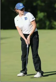  ?? NWA Democrat-Gazette/ANDY SHUPE ?? Duke’s Virginia Elena Carta lines up her putt Tuesday on the 14th green during her match with Ziyi Wang of Stanford. Carta won the match in 24 holes as Duke went on to defeat Stanford 3-2.