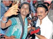  ??  ?? DMK leader MK Stalin posing for a selfie with a party worker in Coimbatore on Friday