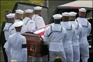  ?? TONY DEJAK — THE ASSOCIATED PRESS ?? The body of Navy Corpsman Maxton Soviak is put into the hearse at Edison High School Stadium Sept. 13 in Milan.