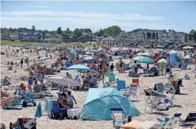 ?? FILE PHOTO ?? Beachgoers flock to Short Sands Beach on July 7, 2022.