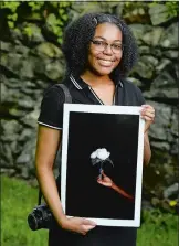  ?? SEAN D. ELLIOT THE DAY ?? Norwich Free Academy senior Teala Avery on Wednesday, May 27 at her Norwich home. She plans to attend Spelman College in Atlanta.