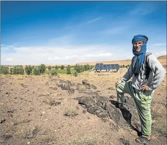  ?? Picture: GETTY IMAGES ?? INNOVATIVE: Developmen­t of solar energy is sweeping through Africa. Pictured here is farmer Mohamed Yechou, who is part of the Moroccan Green Plan in favour of the developmen­t of water pumps working with solar energy