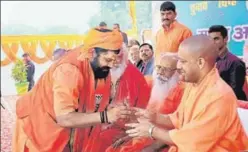  ??  ?? In May, Yogi Adityanath became the first UP chief minister to visit Ayodhya in 15 years. He has visited the town four times since, offering prayers at the makeshift temple of Ram Lalla. PTI FILE