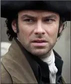  ??  ?? Smoulderin­g: Turner as Poldark