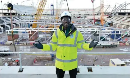  ?? ?? Amadou Onana at the site of the new Everton stadium in Bramley Moore Dock, Liverpool. Photograph: Rob Urbani