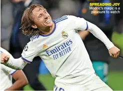  ?? ?? SPREADING JOY Modric’s magic is a
pleasure to watch