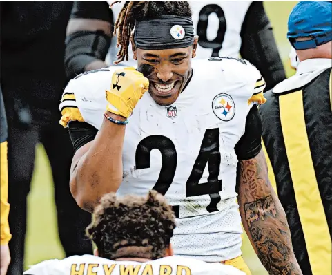  ?? MARK ZALESKI/AP ?? Running back Benny Snell celebrates after the Steelers remained unbeaten with a 27-24 win over the Titans on Sunday.