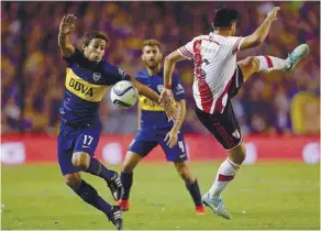  ??  ?? Meli chega habituado a duelos escaldante­s como o Boca-River