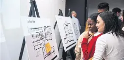  ??  ?? Ryerson students review floorplans at a design study group hosted early last year by the builders of JAC Condos.