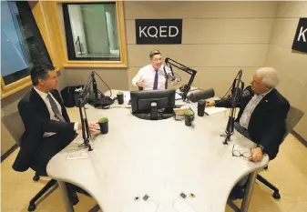  ?? Jeff Chiu / Associated Press ?? Scott Shafer of KQED (center) speaks before moderating a California gubernator­ial debate between Democratic candidate Gavin Newsom (left) and Republican candidate John Cox.