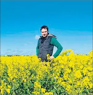  ??  ?? IMPRESSED:
Southern Mallee farmer Tim Mcclelland in a canola crop.