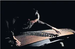  ?? JORDAN NOBLES ?? Dailin Hsieh plays the zheng as part of the Canadian Music Centre B.C.’s “Unaccompan­ied” concert series of live performanc­es of Canadian works for solo instrument­s, available on Picanto.
