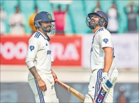  ?? PTI ?? Rohit Sharma (right) celebrates his century with teammate Ravindra Jadeja in Rajkot on Thursday.