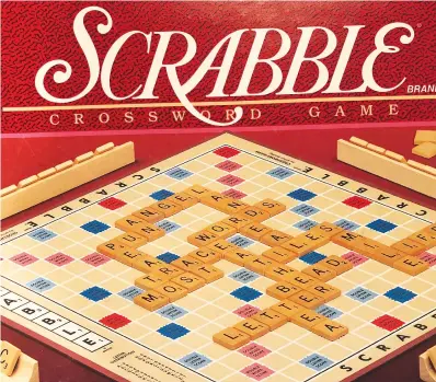  ?? Photo by John Moore ?? ■ John Moore is a fan of Scrabble, Where ‘flipple’ is not a word.