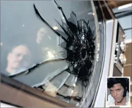  ?? PICTURE: AP ?? LEGENDS: People view a TV with a bullet hole that is on display at the Elvis Presley Memphis complex in Tennessee. The damaged television is one of several that Presley (inset), shot because he didn’t like what was being shown.