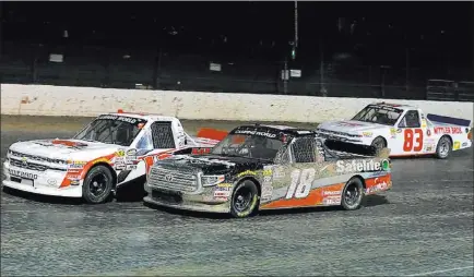  ??  ?? Courtesy Kyle Busch Motorsport­s Las Vegan Noah Gragson (18) rallied to finish sixth in the NASCAR Truck Series race at the Eldora (Ohio) Speedway half-mile clay oval.