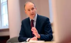  ??  ?? REVELATION­S: Taoiseach Micheál Martin addressing survivors in a video conference on Tuesday before the report’s release