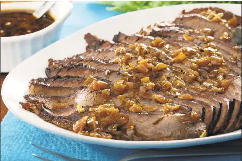  ?? Michael Tercha / Tribune News Service ?? A pure and simple brisket recipe for Passover from cookbook author Amelia Saltsman, plus five ways to jazz it up.