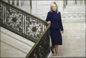  ?? PETER MORRISON — THE ASSOCIATED PRESS ?? Sinn Fein Vice President Michelle O'Neill walks through Stormont Parliament Buildings in Belfast, Northern Ireland, Saturday.