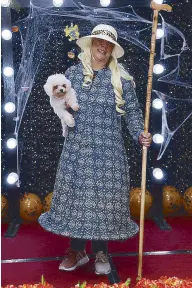  ??  ?? Little Bo-Peep and sheep: Phil Star Lifestyle’s Kathy Moran and her dog Gorby, the costume idea of which she got from Tweetie De LeonGonzal­ez.