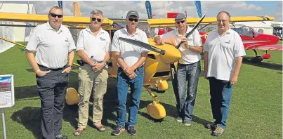  ??  ?? From left: Mr Stewart, Light Aircraft Associatio­n inspector Adrian Lloyd, Roger Cornwell and Steve Williams of Eurofox UK and ASK Flying Club investor Neil Watt.