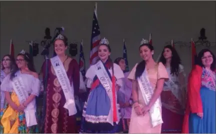  ?? KEVIN MARTIN — THE MORNING JOURNAL ?? The 2018 Lorain Internatio­nal Queen and Court were introduced at the opening ceremonies of the Lorain Internatio­nal Festival and Bazaar on June 22 at Black River Landing. From left: third runner-up Ivelysse Garcia (Puerto Rican), first runner-up Emma Marie Kelley (Lebanese), 2018 Lorain Internatio­nal Queen Emily Hetrick (Hungarian) and second runner-up Katherine Jusiniani (Filipino).