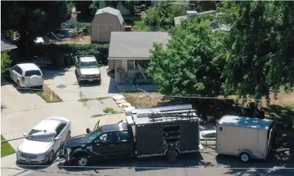  ?? Photograph: Laura Seitz/AP ?? Law enforcemen­t investigat­e the scene of a shooting involving the FBI in Provo, Utah, 9 August.