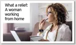  ??  ?? What a relief: A woman working from home