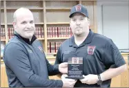  ?? TIMES photograph by Annette Beard ?? At the Tuesday, Nov. 15, City council meeting, Fire Chief Jared Powell honored Lt. Shane Henson, volunteer firefighte­r, with the Fire Service Honor Award for his actions of putting his own life in danger to save the lives of others, on Monday, Aug. 15.