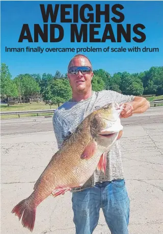  ?? FOR THE SUN- TIMES ?? Johnathan Inman with his soon- to- be Illinois- record freshwater drum.