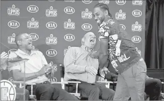  ?? Wally Skalij Los Angeles Times ?? NEW CLIPPERS player Kawhi Leonard shares a big laugh with Clippers coach Doc Rivers, left, and owner Steve Ballmer on the dais during Wednesday’s introducto­ry news conference.