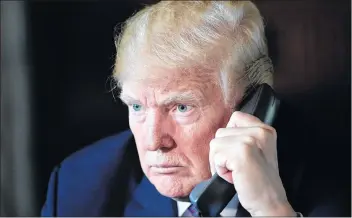  ?? AP PHOTO ?? President Donald Trump talks with troops via teleconfer­ence from his Mar-a-Lago estate in Palm Beach, Fla., Thursday.