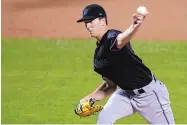  ?? JOHN MINCHILLO/ASSOCIATED PRESS ?? Carlsbad native Trevor Rogers pitches against the New York Mets for Miami in his major league debut on Tuesday. He is expected to get another start for the Marlins.