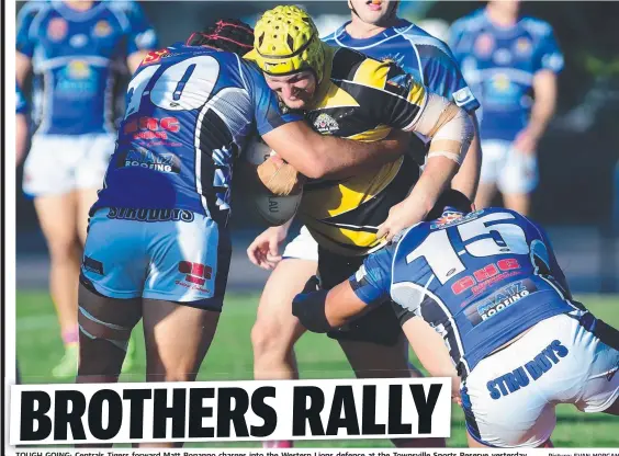  ?? TOUGH GOING:GOING CentralsCe t l TigersTi f forwardd Matt Bonanno charges into the Western Lions defence at the Townsville Sports Reserve yesterday. Picture: EVAN MORGAN ??