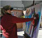  ??  ?? 2
2
Barbara Meikle of Barbara Meikle Fine Art paints during the 2018 Spring Art Festival.