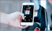  ?? PROVIDED TO CHINA DAILY ?? By simply scanning a QR code on the bike, users can unlock it and ride away in mere seconds thanks to the IoT chips inside.