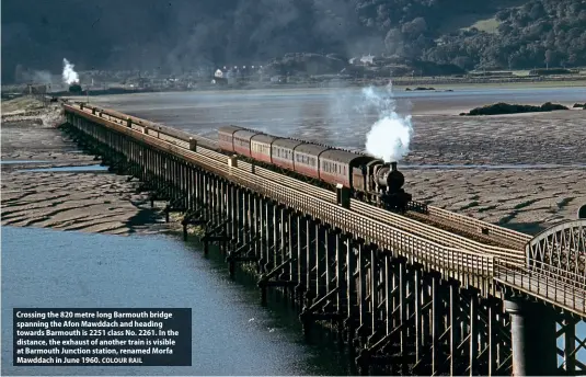  ?? COLOUR RAIL ?? Crossing the 820 metre long Barmouth bridge spanning the Afon Mawddach and heading towards Barmouth is 2251 class No. 2261. In the distance, the exhaust of another train is visible at Barmouth Junction station, renamed Morfa Mawddach in June 1960.