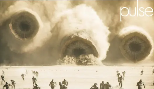  ?? WARNER BROS. PHOTOS ?? Staggering­ly large sandworms bear down on enemy troops fighting for control of the spice planet Arrakis in “Dune: Part Two.”