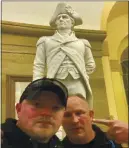  ?? COURTESY UNITED STATES CAPITOL POLICE ?? Rocky
Mount PolIce Department Sgt. Thomas “T.J.” Robertson and officer Jacob Fracker In the U.S. CapItol In front of a statute of John Stark.