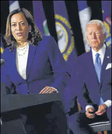  ?? AFP ?? Senator Kamala Harris speaks as a Democratic vice-presidenti­al nominee as Joe Biden looks on at an event in Delaware.