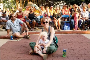  ?? STAFF FILE PHOTOS ?? Kat Caldwell watches a Nightfall concert with her son, Joe, at Miller Plaza in July 2019. Below: Members of the Vandoliers perform at Nightfall in May 2018 at Miller Plaza.