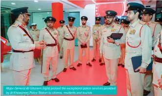  ?? ?? Major General Ali Ghanem (right) praised the exceptiona­l police services provided by Al Khawaneej Police Station to citizens, residents and tourists