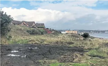  ??  ?? LAND WAR: The site at Seafield, Kirkcaldy, where eight luxury houses are planned.