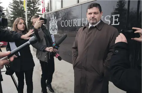  ?? AMBER BRACKEN/ THE CANADIAN PRESS ?? Crown prosecutor Lloyd Stang speaks to media in Meadow Lake on Friday after a teen admitted to killing four people at a high school and in a home in northern Saskatchew­an. The teen entered guilty pleas in the Jan. 22 shooting deaths.