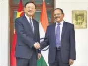  ?? PTI PHOTO ?? National security adviser Ajit Doval with Chinese state councillor Yang Jiechi in New Delhi on Friday.