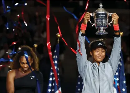  ?? FOTO: LEHTIKUVA/AFP PHOTO/JULIAN FINNEY ?? Naomi Osaka besegrade sin idol i US Open-finalen och vann sin första grand slam-titel.